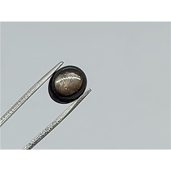 5.23 ct . BLACK STAR SAPPHIRE