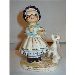 1958 OLD MOTHER HUBBARD WITH  DOG FIGURINE MADE#1810190