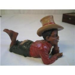 Boy wearing a big Hat and resting laying down #1814310