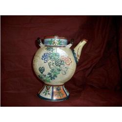 Japanese tea pot whit chrysantemum flowers #1822877