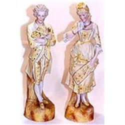 Yellow Bisque statues of a lady and a gentleman#1845326
