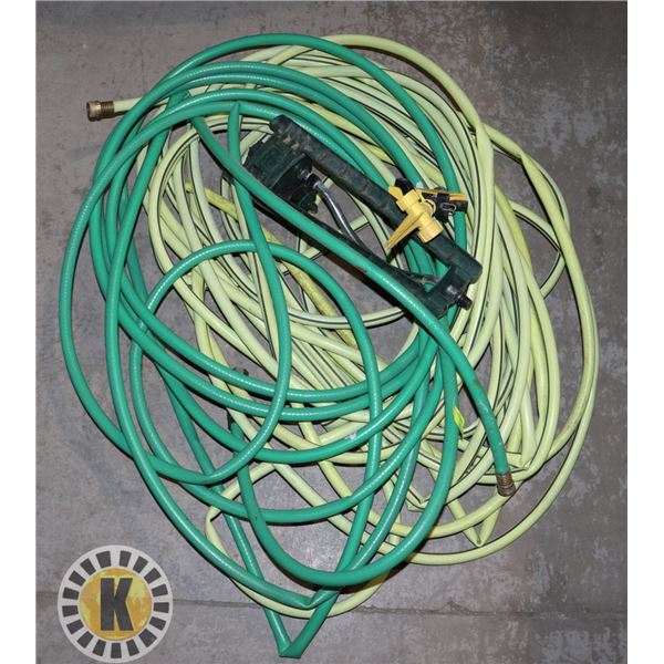 2 GARDEN HOSES WITH SPRINKLER END AND FLOOR MOUNT