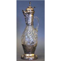 CONTINENTAL SILVER DECANTER with cherubs,