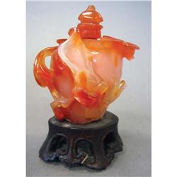 CHINESE CARVED STONE SNUFF BOTTLE with sta