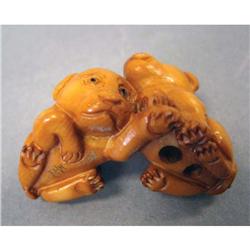 NETSUKE OF TWO PUPPIES artist signed lengt