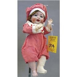 BABY BISQUE HEAD DOLL with red outfit leng