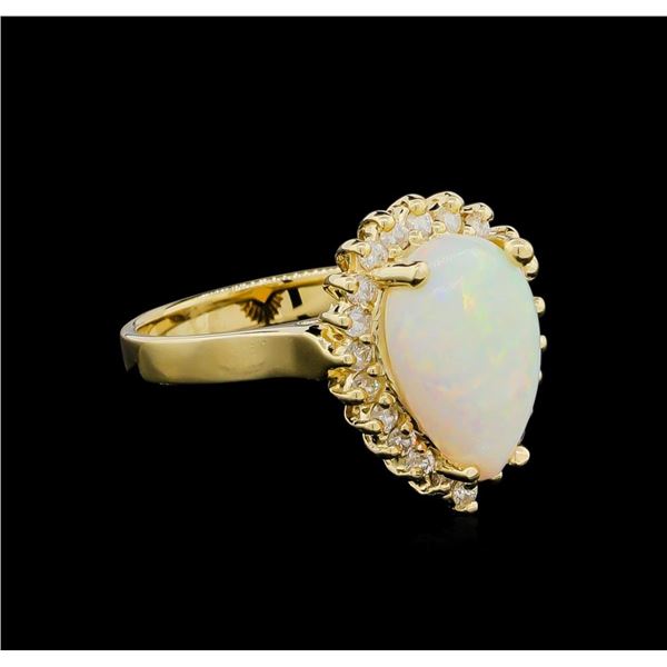 1.00 ctw Opal and Diamond Ring - 14KT Yellow Gold