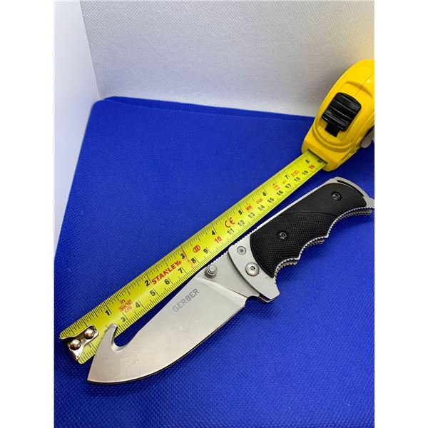 Gerber Folding Pocket Knife with Case Covering.