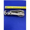 Image 2 : Leatherman Skeletool Folding Pocket Knife with Clip.