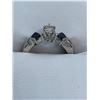Image 3 : Platinum lady's cast 3-stone ring (o.57ct), one round Diamond with 2 two half bezel princess cut dia
