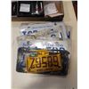 Image 2 : Lot of Canadian license plates with tray of e cigarettes and juice