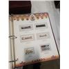 Image 8 : UNITY CANADA STAMP ALBUM WITH MANY STAMPS AND UNITED STATES SEAL STAMP ALBUM WITH FEW STAMPS