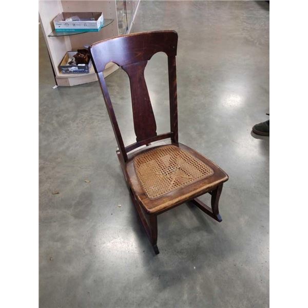 Vintage wood cane seat rocking chair