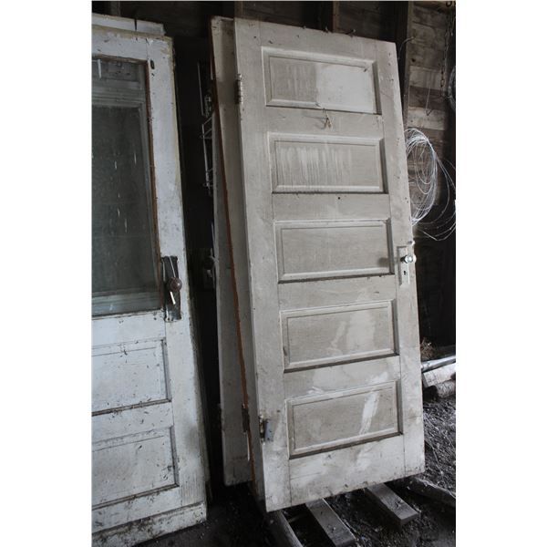 Old Doors with hardware and Wooden Posts