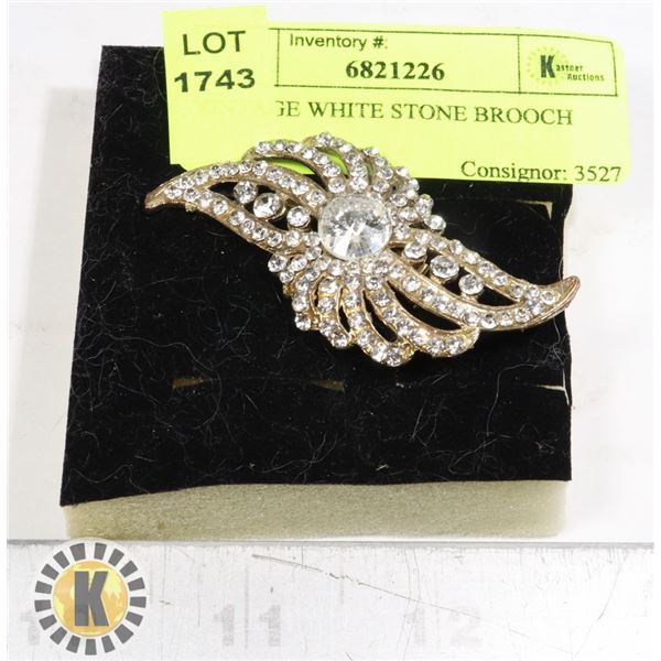 VINTAGE WHITE STONE BROOCH