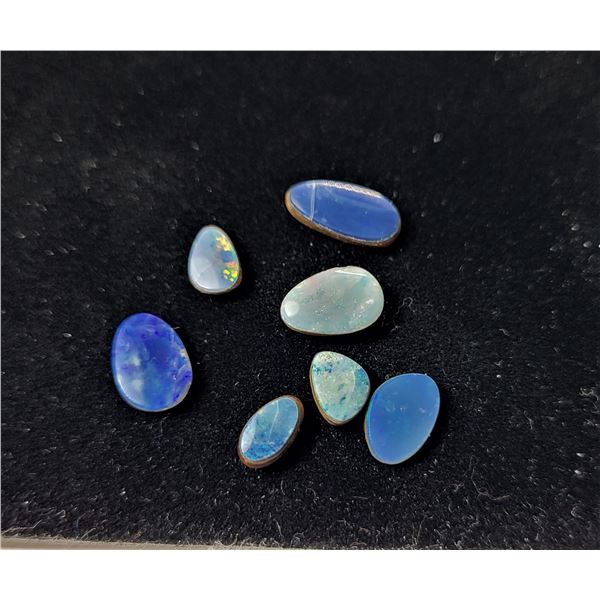 20)  LOT OF 7 NATURAL AUSTRALIAN OPALS, 4 CT
