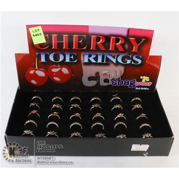 DISPLAY BOX OF CHERRY TOE RINGS.