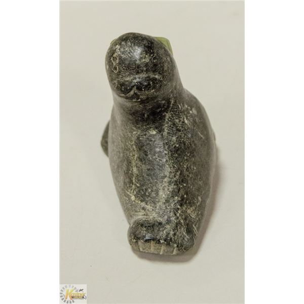 INUIT SOAPSTONE SEAL CARVING. SIGNED IN SYLLABICS