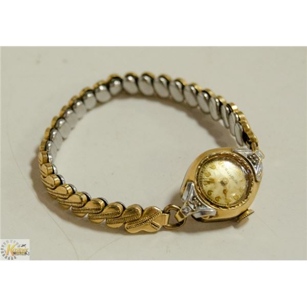 BULOVA 10 K GOLD-FILLED WATCH WITH DIAMONDS