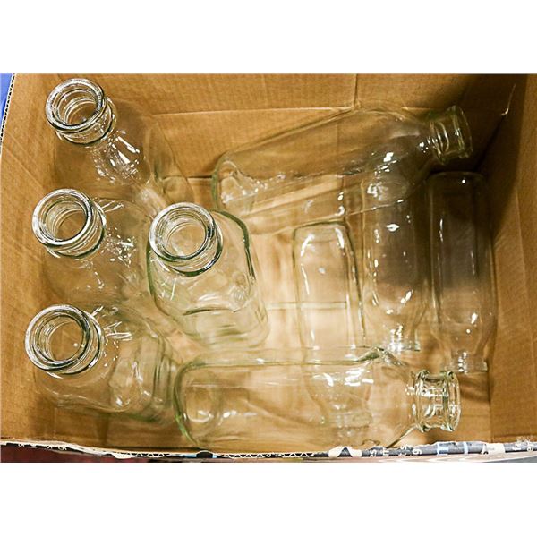 BOX OF GLASS MILK BOTTLES