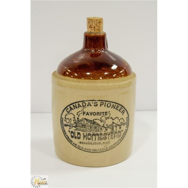 CANADAS PIONEER STONEWARE DECANTER