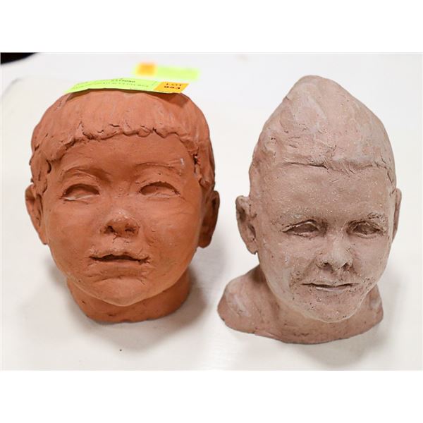 PAIR OF HEAD SCULPTURES