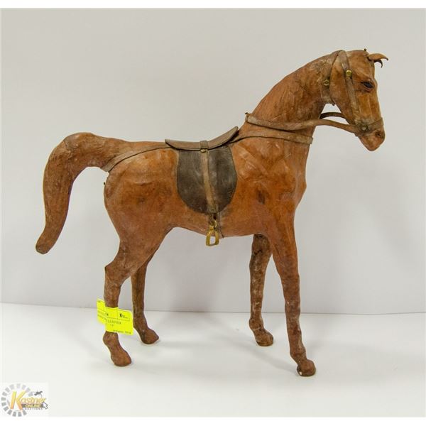 ANTIQUE GLASS EYE LEATHER HORSE WITH SADDLE. 13"