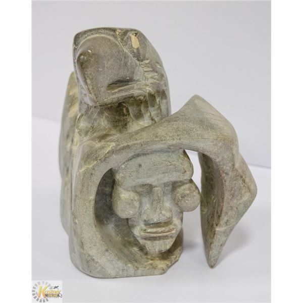 1ST NATIONS STONE CARVING /W INLAID EYES. SIGNED