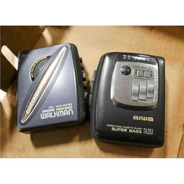 PAIR OF 2 VINTAGE CASSETTE WALKMANS - SONY & AIWA