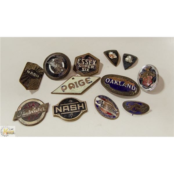 BAG OF OLD CAR EMBLEMS