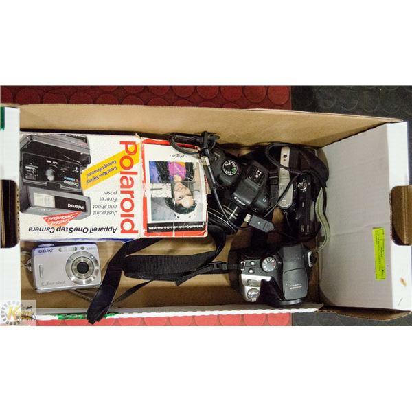 BOX OF DIGITAL CAMERA AND POLAROID