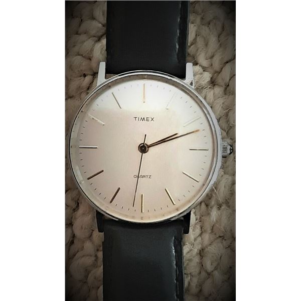 TIMEX M CELL WATCH WITH WHITE DIAL.