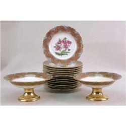THIRTEEN HAND-PAINTED AND GILT-DECORATED LUNCHEON PLATES