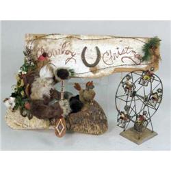 A SCULPTURAL METAL FERRIS WHEEL AND RIDERS