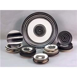 A THROWN-CLAY BROWN-AND-CREAM SERVING PLATTER