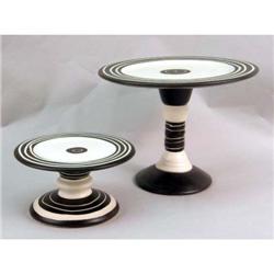 THREE THROWN-CLAY BROWN-AND-CREAM FOOTED SERVING DISHES