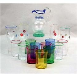 A MURANO BLOWN-GLASS PITCHER AND FOUR ASYMMETRICAL MATCHING GLASSES