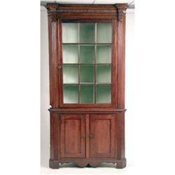 A CHIPPENDALE STAINED PINE CORNER CUPBOARD