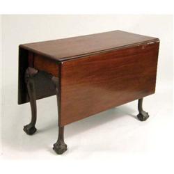 A GEORGE II SHELL-CARVED MAHOGANY DROP LEAF DINING TABLE