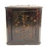 Image 1 : A CHINOISERIE-PAINTED AND JAPANNED HANGING CORNER CUPBOARD