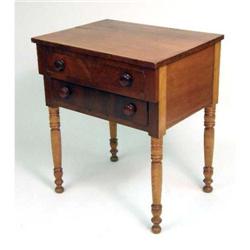 AN EMPIRE TWO-DRAWER WORK TABLE