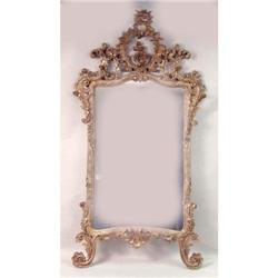 A ROCOCO-STYLE GILTWOOD OVERMANTLE MIRROR