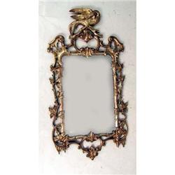 A GEORGE II-STYLE GILTWOOD LOOKING GLASS