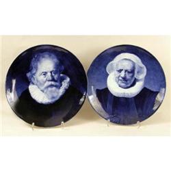 A PAIR OF BLUE AND WHITE DELFT CONVEX CIRCULAR PLATTERS