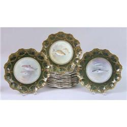 A GROUP OF TWELVE PORCELAIN POLYCHROME AND PARCEL-GILT DECORATED FISH PLATES