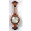 Image 1 : A VICTORIAN CARVED AND FIGURED OAK "BANJO" BAROMETER