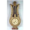 Image 1 : A GILTWOOD APPLIED GESSO LYRE FORM WALL CLOCK