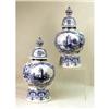 Image 1 : A PAIR OF BLUE AND WHITE DELFT COVERED URNS