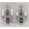 Image 1 : A PAIR OF TWO-ARMED COLORLESS GLASS WALL SCONCES