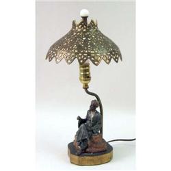 A PAINTED METAL FIGURAL LAMP